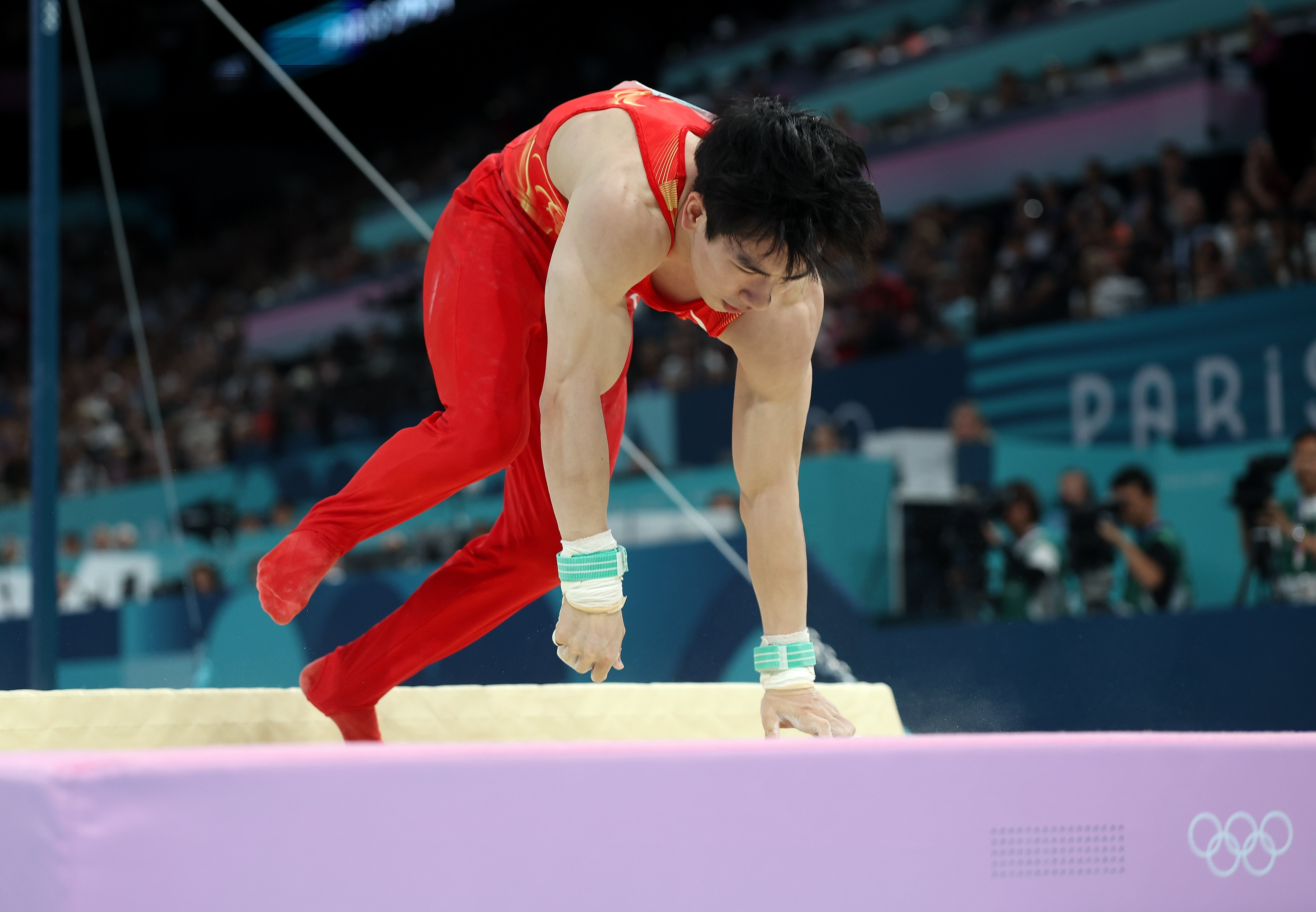 关于体操倒立男子单项赛场实力较量的信息